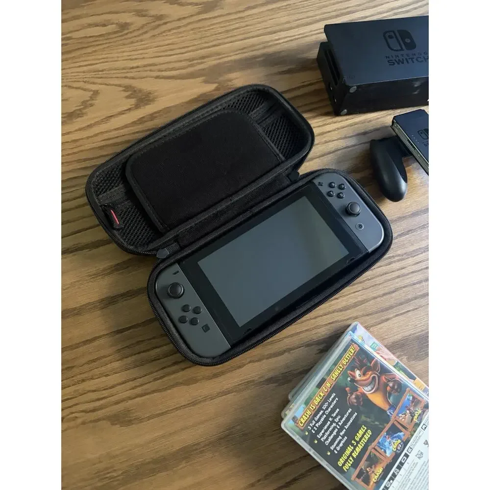 Nintendo Switch Console Gray Bundle with Games Kirby Pikachu Crash and Case